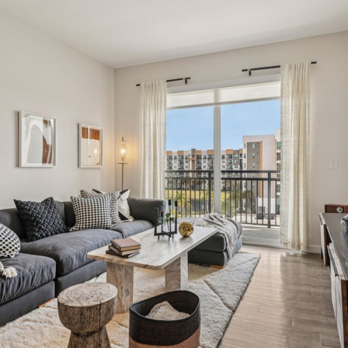 a living room with a couch and a table