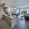 a kitchen and living room