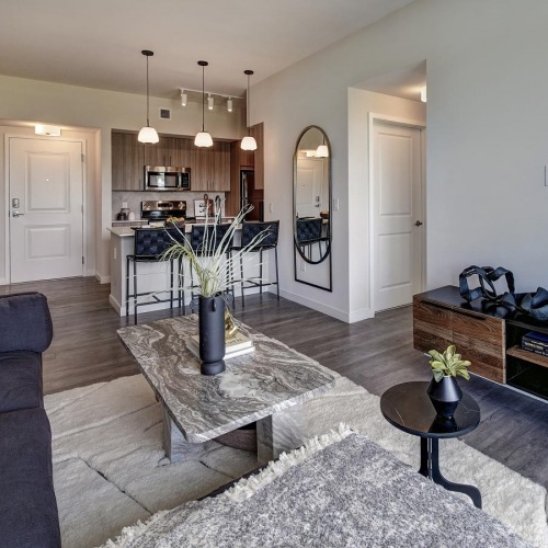 Living spaces designed for relaxation a living room with a couch and a table